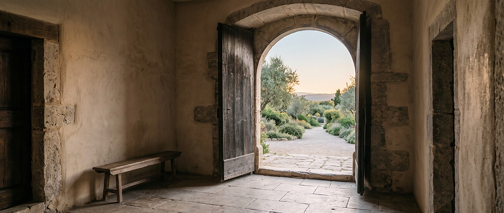 Open stone doorway leading into a quiet garden, suggesting threshold, discernment, and new life.
