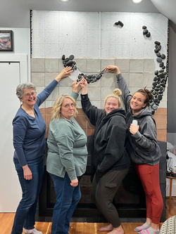A joyful group of Elemental Claycationers, laughing and creating together at a pottery retreat in Sa
