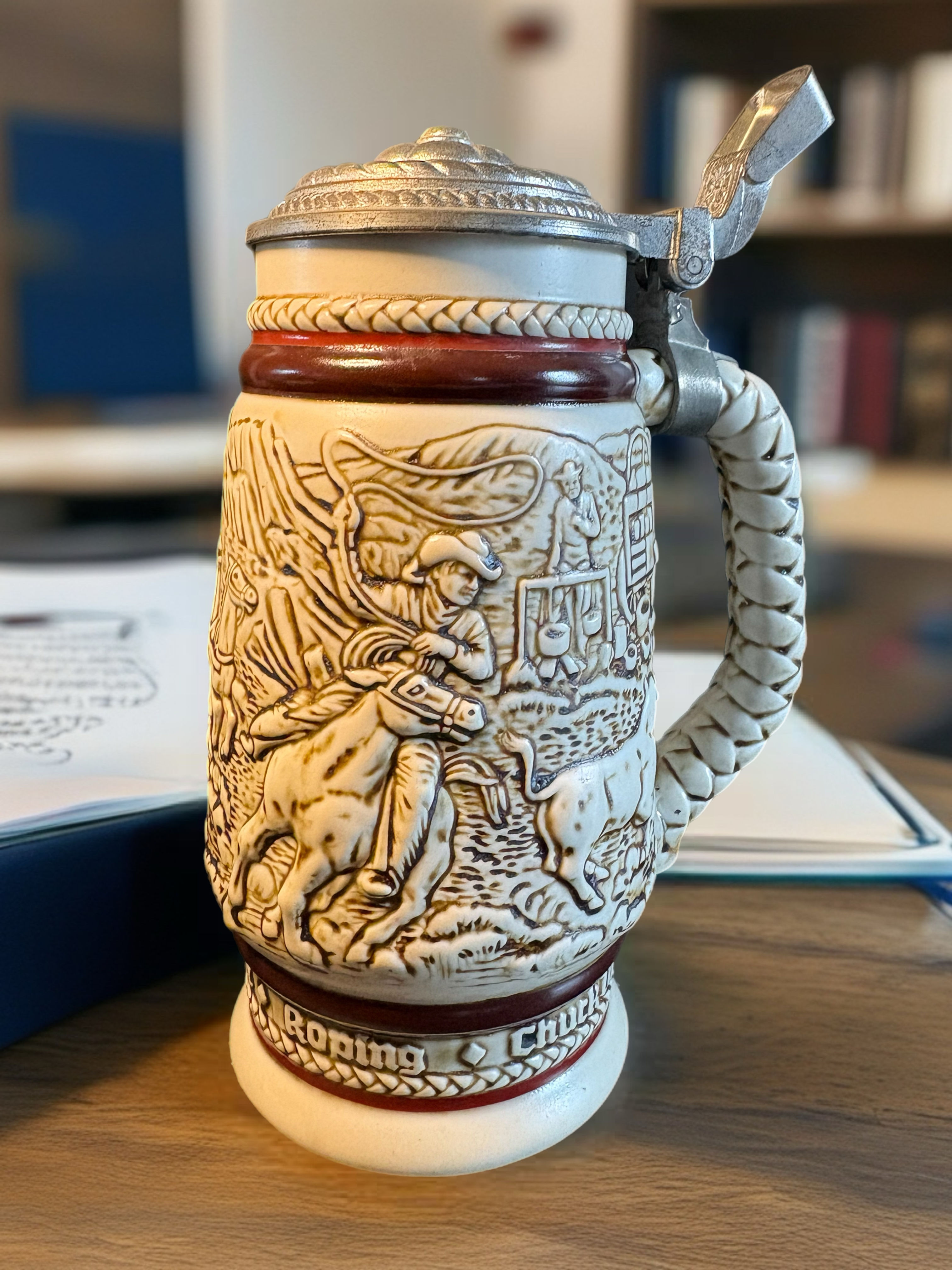 Vintage Avon Western beer stein with detailed cowboy and stagecoach relief, pewter lid, handcrafted in Brazil 1980