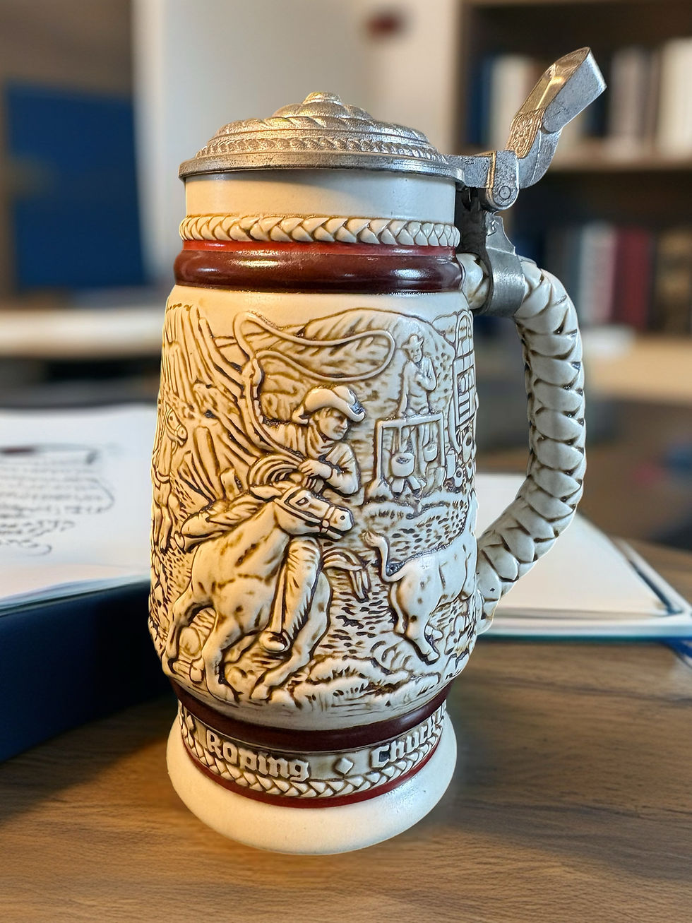 Vintage Avon Western beer stein with detailed cowboy and stagecoach relief, pewter lid, handcrafted in Brazil 1980