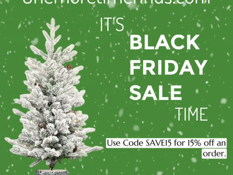 Christmas tree with snow falling in background. Use coupon code SAVE15 for 15% off an order.