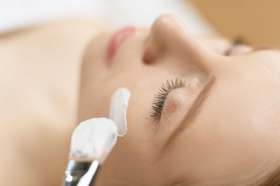 Woman getting a chemical peel treatment.