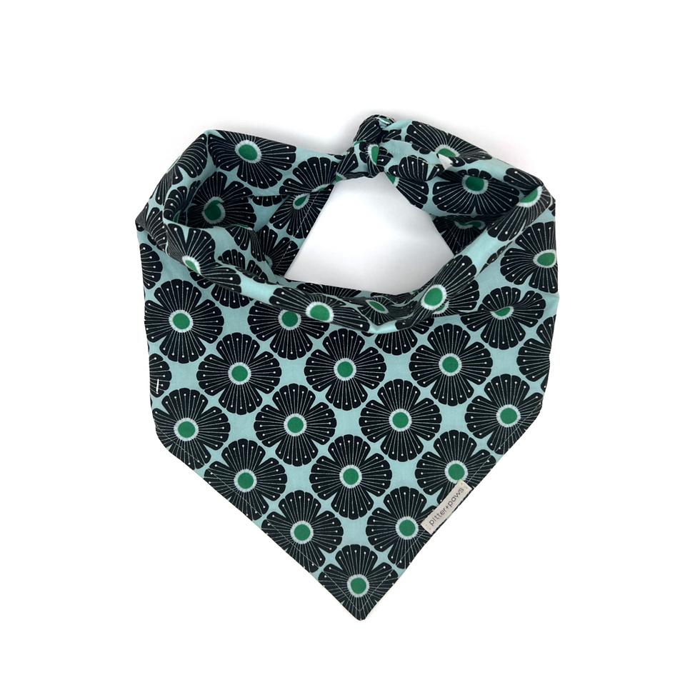 Spring themed classic tie-on dog bandana with black and green floral pattern