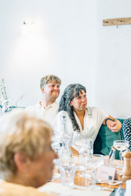 Groom smiling and bride happy crying