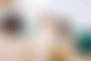 Bride and groom laughing at speeches