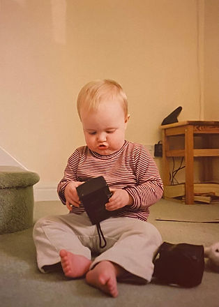 Baby looking at a camera