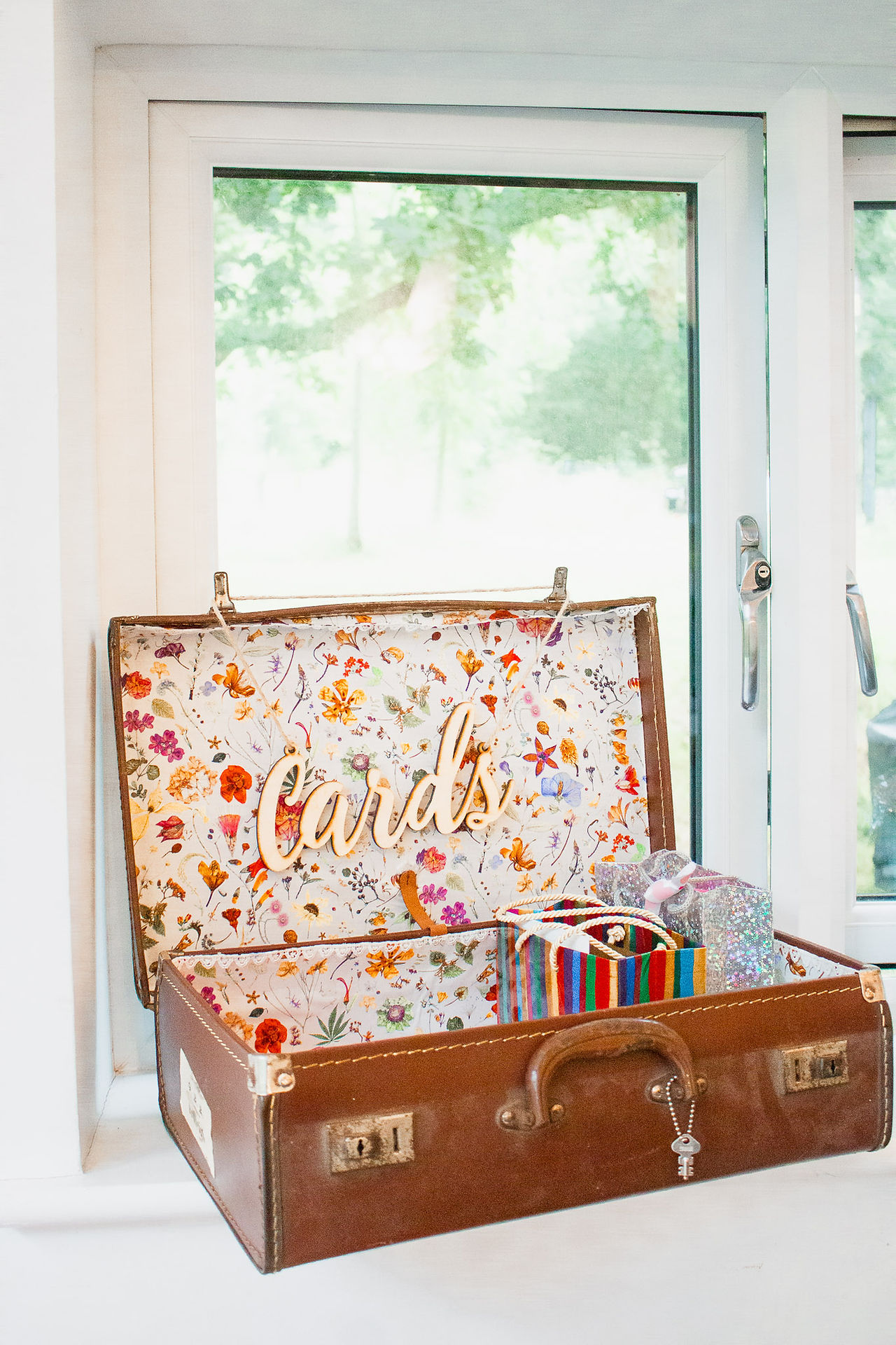 DIY card box made of old leather suitcase. Higher Holcombe, Festival wedding venue. Exeter, Devon, UK