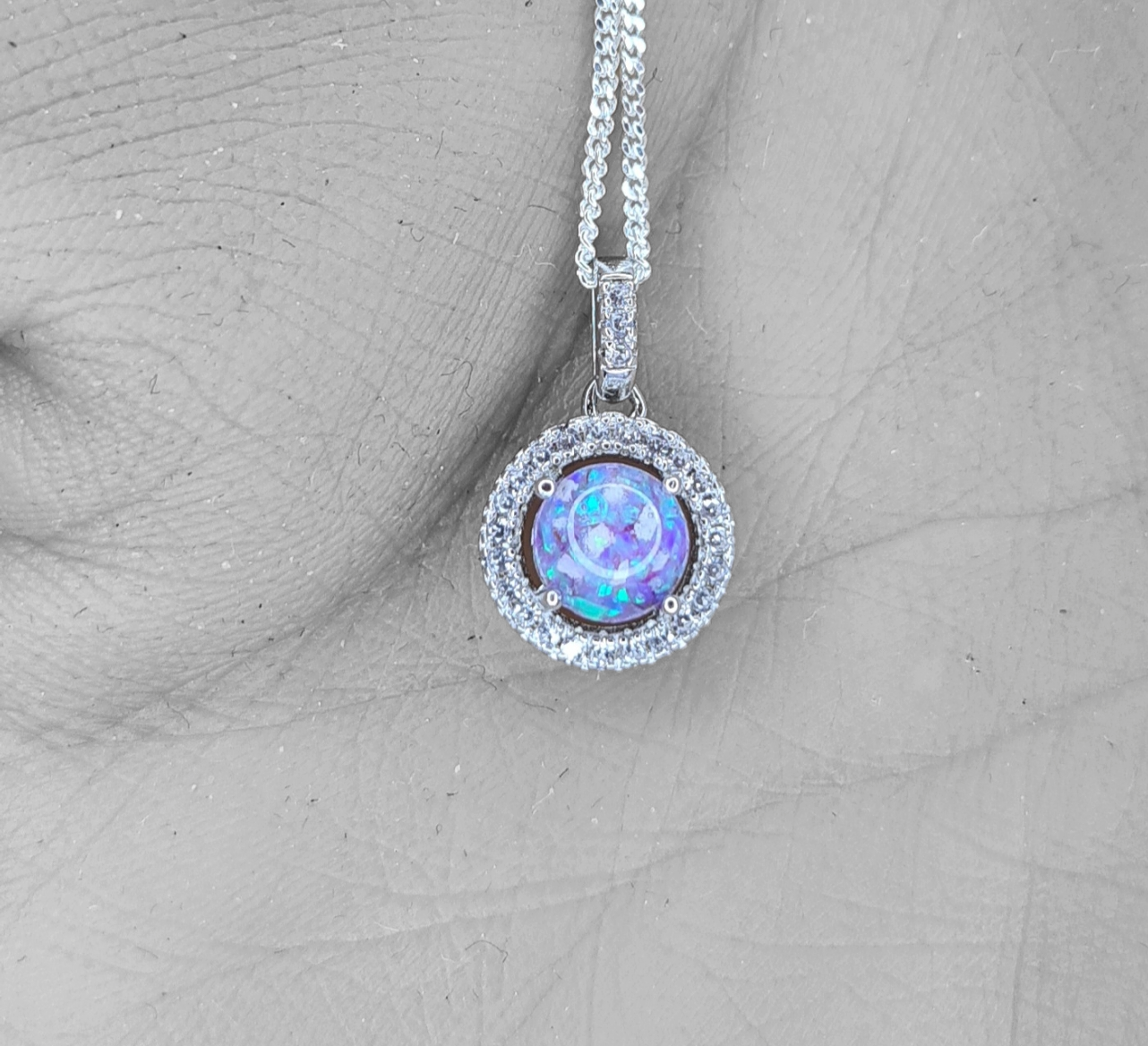 Silver memorial pendant suitable for ashes, breastmilk, hair or fur. Made with love in the UK