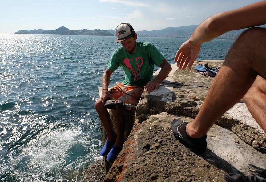 Slacklining Paradise features adventurous athletes crossin an unusual slack line rig over the Pacific Ocean in Acapulco Mexico. Photo by Rodrigo Gaya/Gayaman Visual Studio, LLC. All rights reserved.