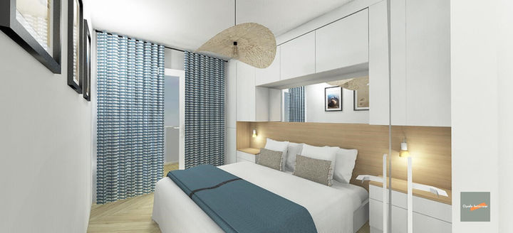 Chambre lit double, décor bleu clair, ambiance sereine