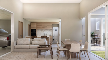 Para atender às demandas do casal por uma casa térrea com três dormitórios e uma área social para receber amigos em um terreno de 140m², adotamos uma abordagem cuidadosa no projeto. Integrando sala de estar, jantar e cozinha em um único espaço, harmonizamos a área gourmet e o jardim de inverno, atendendo ao desejo da futura moradora. A inclusão de uma ampla abertura na sala conecta à garagem, expandindo a área de convivência quando necessário. O resultado é um ambiente versátil e visualmente espaçoso, perfeito para encontros e eventos, atendendo plenamente às necessidades do casal.