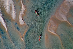 Aerial view of two Kayaks exploring the waterways and sandbanks of Round Hill Creek