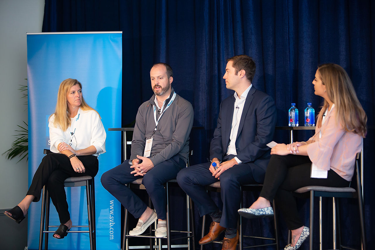 Four people panel speaking at Silicon Valley Bank event