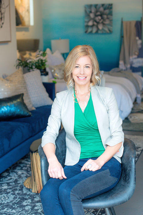 Female-posing-for-Brand-headshot-photo-of-Interior-designer-Sarah-Paschall-Clutch-Modern