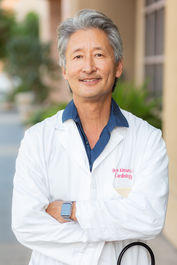 Japanese man Bruce Kimura MD posing for headshot