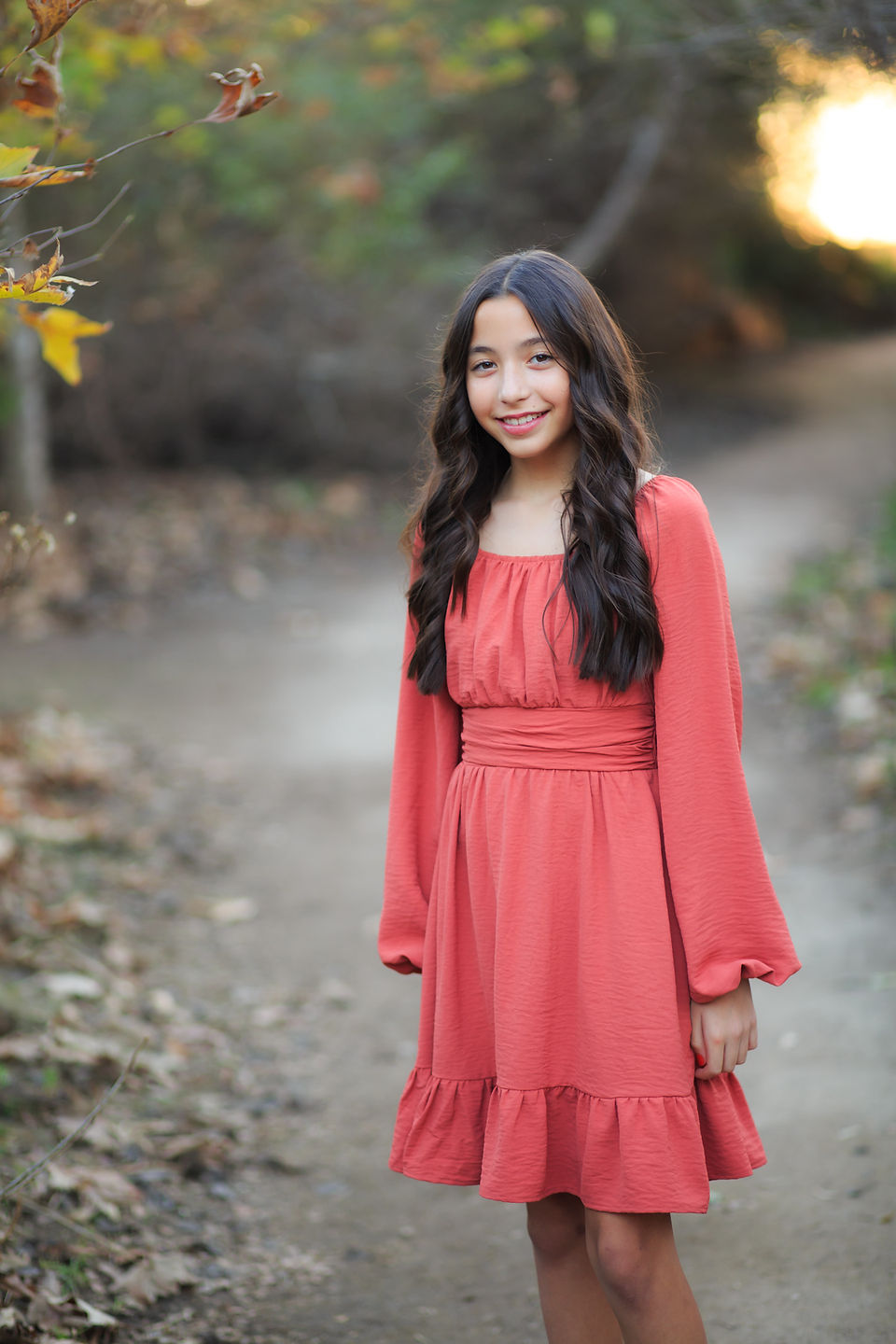 Young teenage girl posing for photo