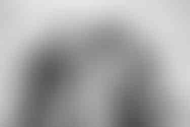 Mother-and-three-sons-posing-for-family-photo-Ponto-Beach-Carlsbad