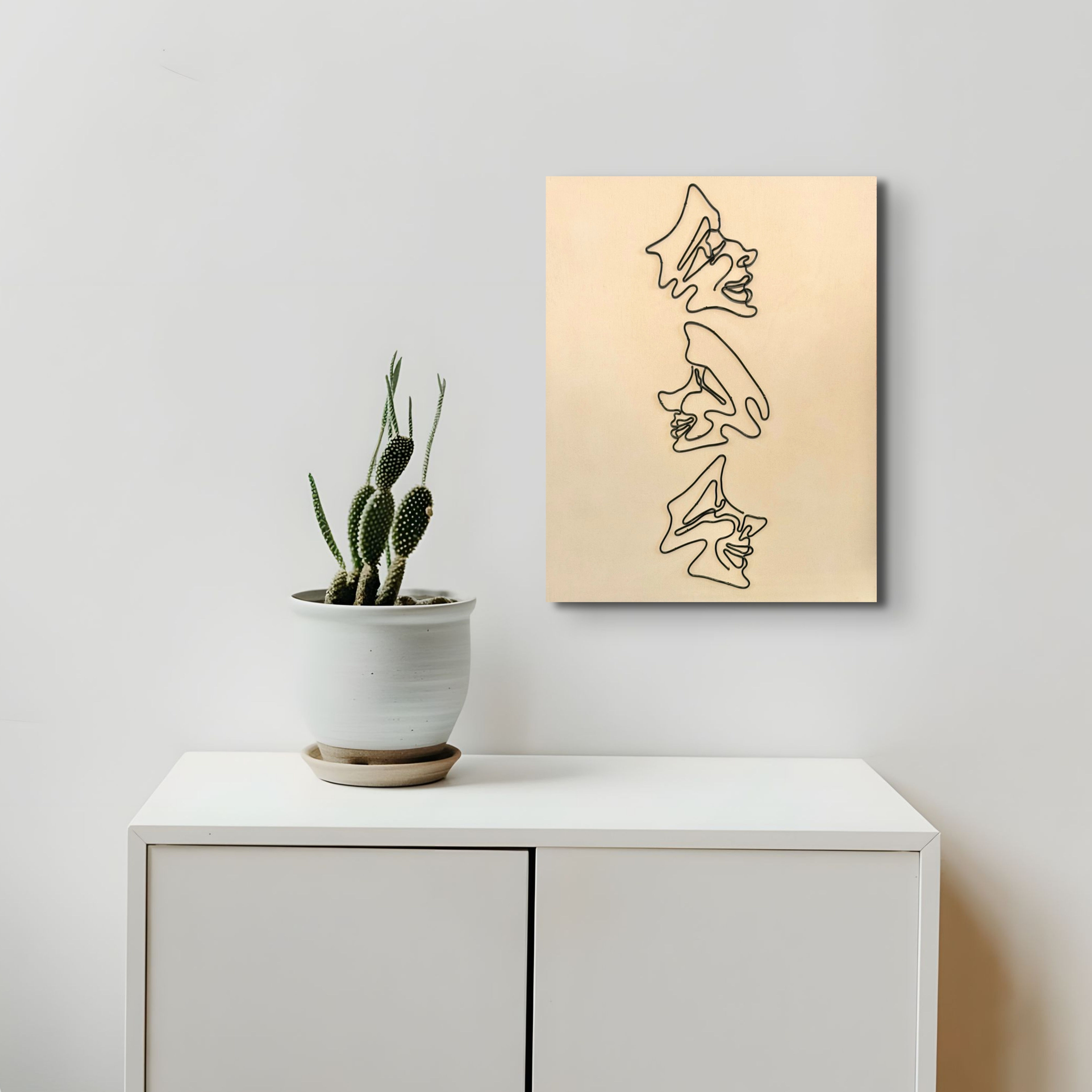 Three Faces | Wire Sculpture | On Wood Panel