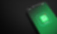 social-media-whatsapp-icons-logos-mobile-phone-screen-3d-background-with-copy-space-text (