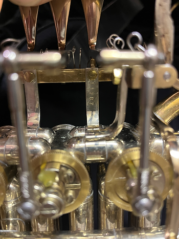 Finke serial number on a Brendan. The number is stamped on the finger paddle bracket. 11202 indicates that this is the 2nd horn produced in January of 2012.