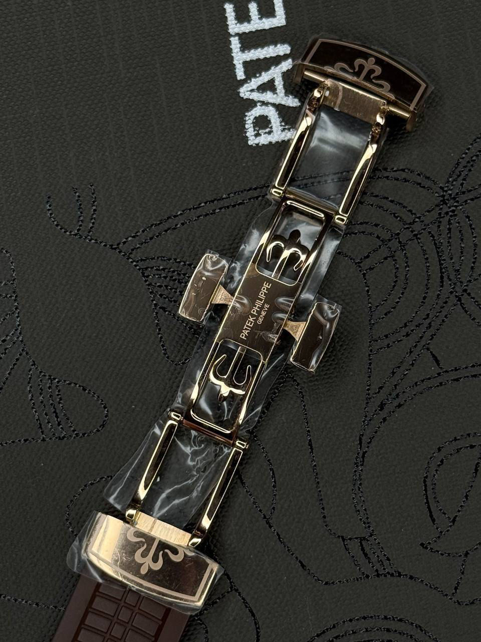 Miniatura: Patek Philippe AQUANAUT Travel time