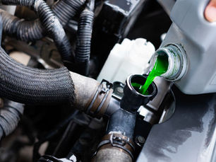 Automotive Fluids Are Different Colors to Help Identify Them
