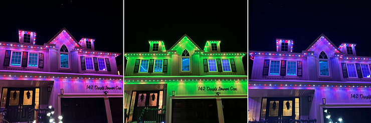 House with festive lights in pink, green, and blue against night sky.