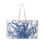 Thumbnail: Blue octopus on beige beach tote bag with rope handles.