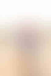 Family of 3 playing along shoreline