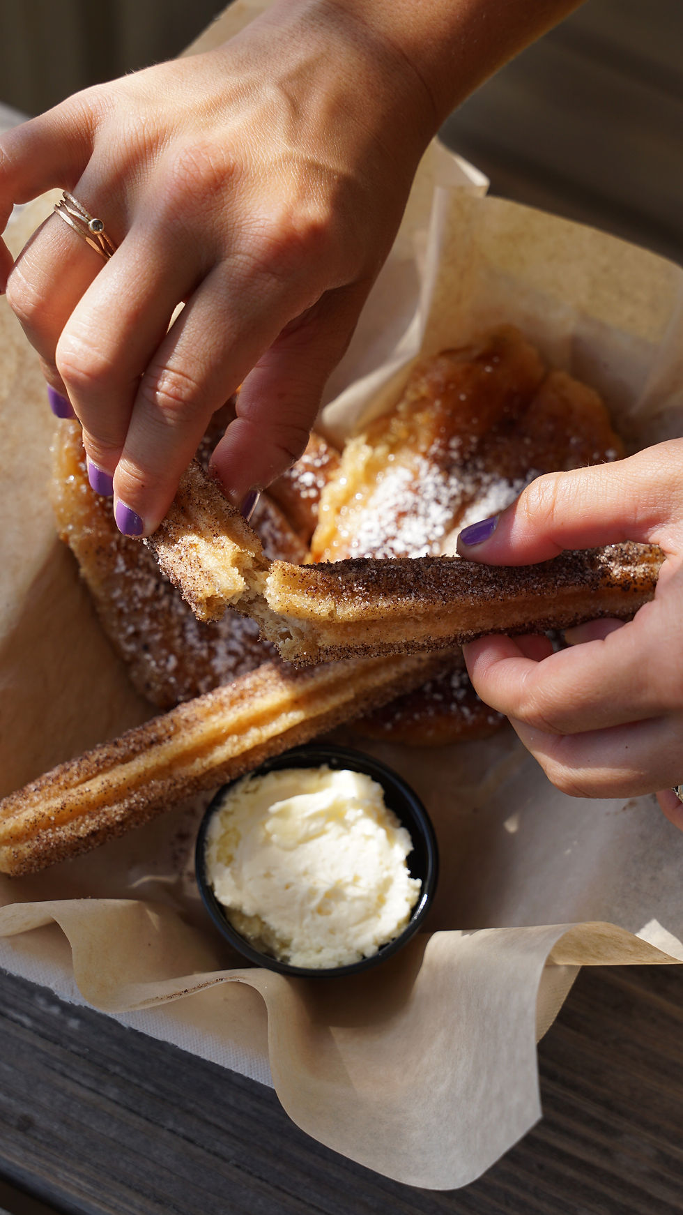 Cinnamon sugar churros served with vanilla bean ice cream