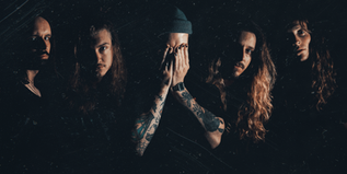 "Yes we play sad music, but we love doing it." - LASTELLE Interview