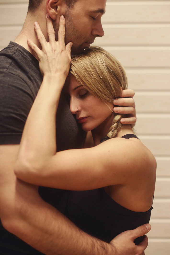 Woman embracing man, close up. A Nő világa - Budapest - 2018. Romantic hug scene.