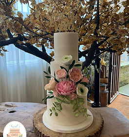 3 Tiers sugar roses and ranunculus wedding cake.jpg
