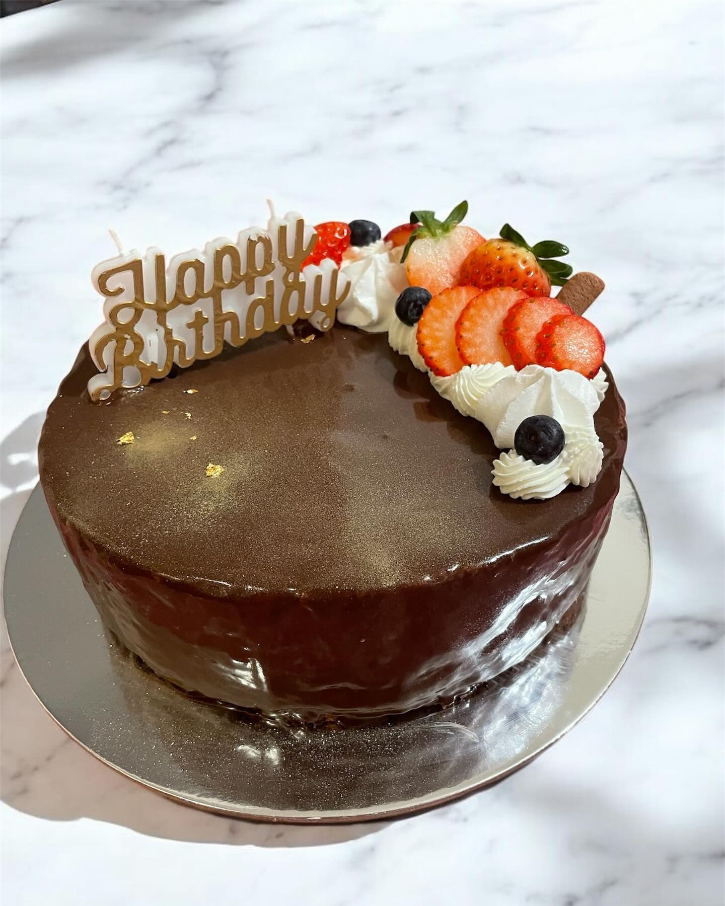 Glossy red chocolate heart mousse cake