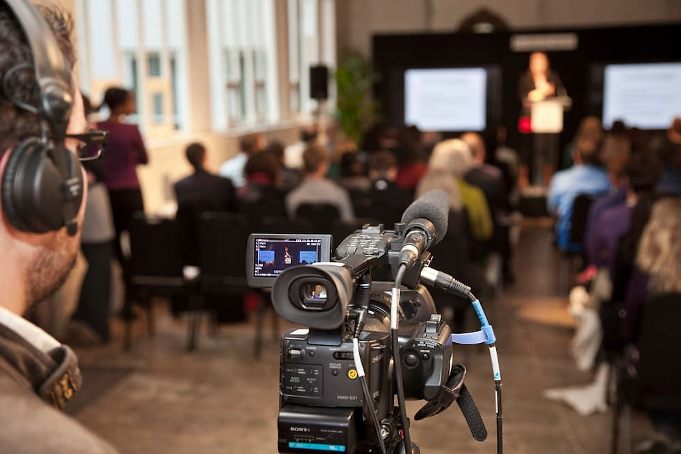 Cameraman at an event by Studio Cube