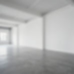 Empty commercial space with concrete floor