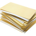 A pile of manila file folders.