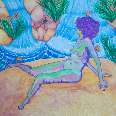A woman relaxes on a large rock over looking two very beautiful waterfalls that pool around the rock she is sitting on.