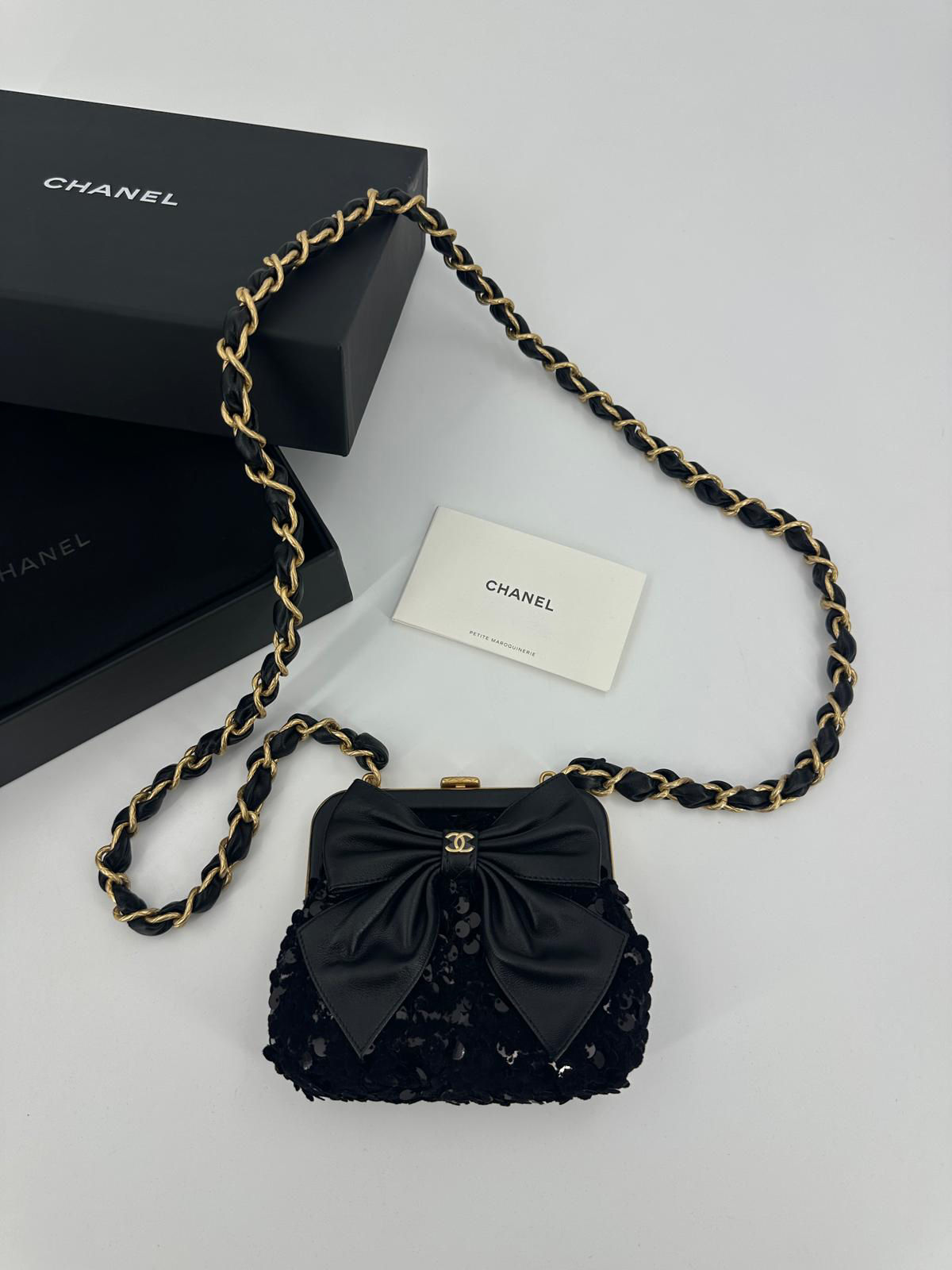 Chanel 24A Sequin Lambskin Tweed Black Bow Mini Clutch Bag