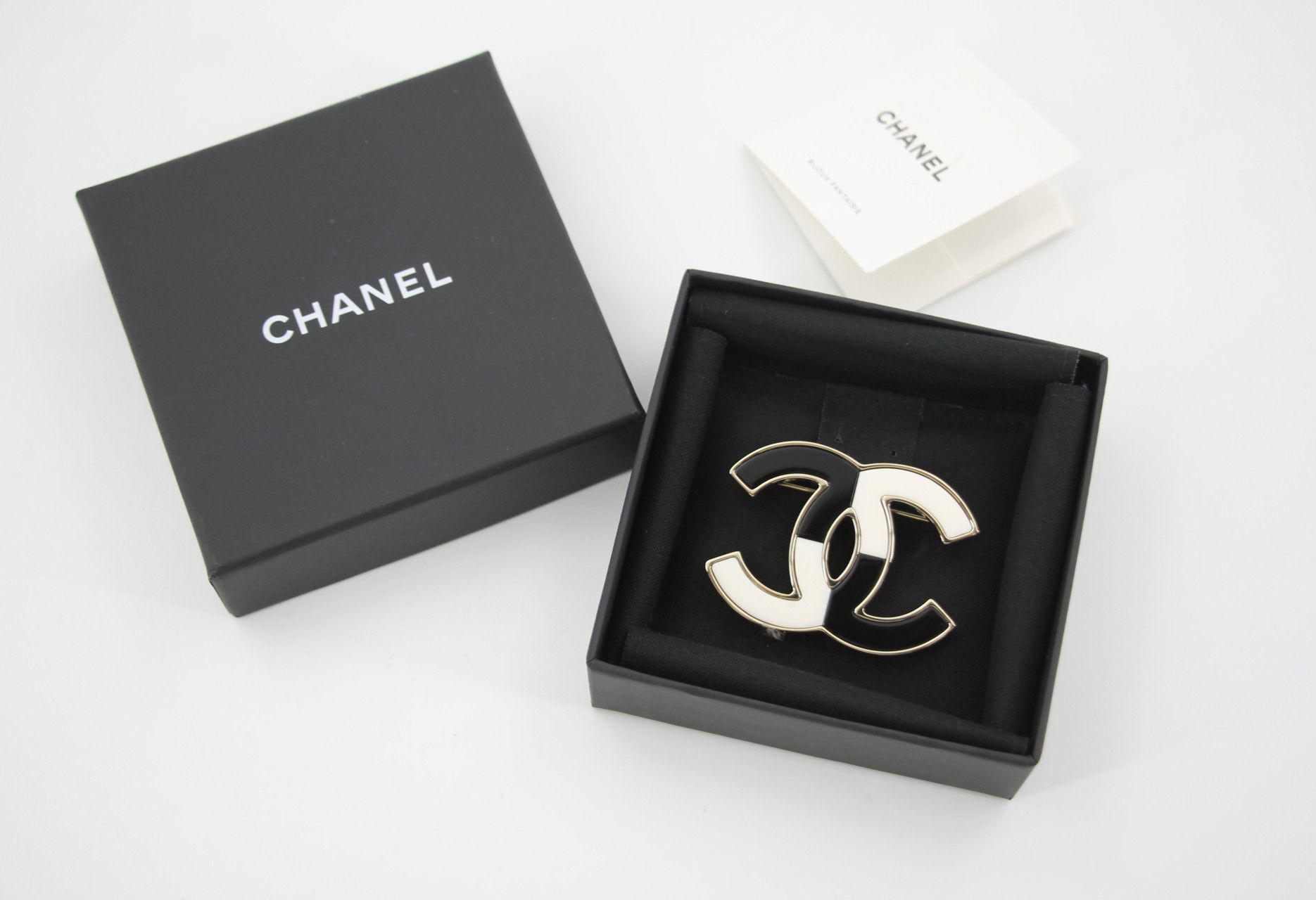 Chanel B23C Enamel Black and White Two-Tone CC Brooch