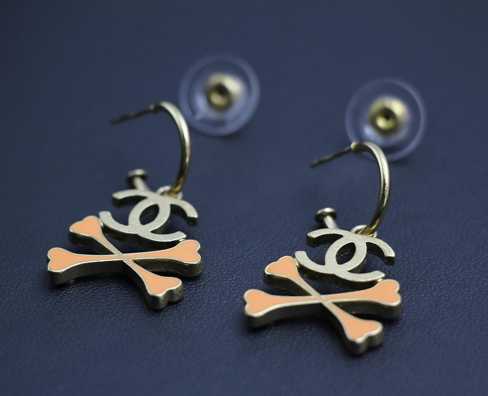 Thumbnail: Chanel Vintage 03P Enamel Skull Orange Hoop Stud Earrings