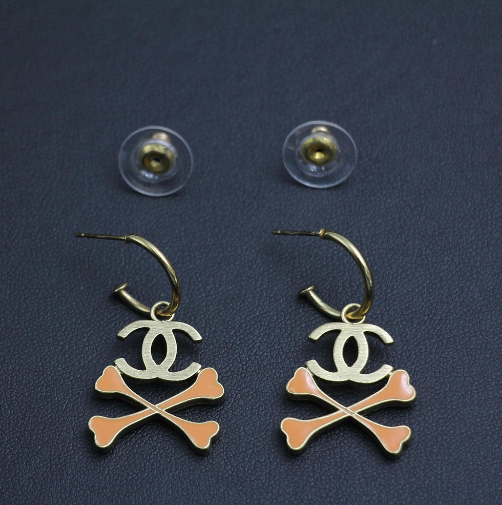 Thumbnail: Chanel Vintage 03P Enamel Skull Orange Hoop Stud Earrings