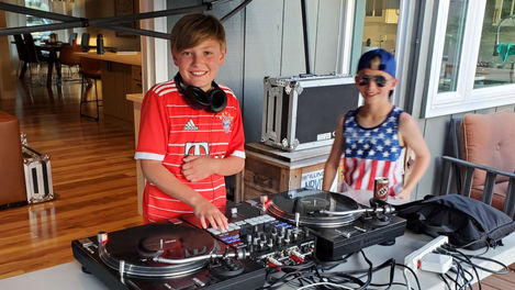 dj's cash and cam using a set of turntables