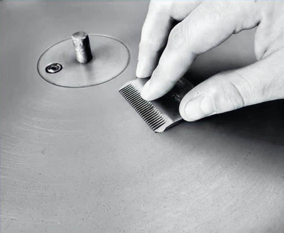 Eye-level view of a sharpening workshop with tools and equipment