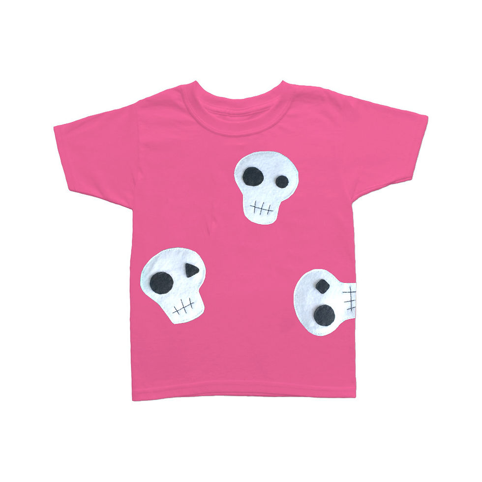 Pink kids t-shirt with three white cartoon skulls