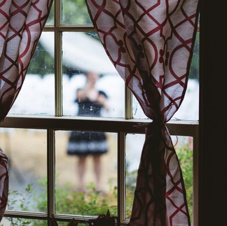 a picture through the window of the ceremony.