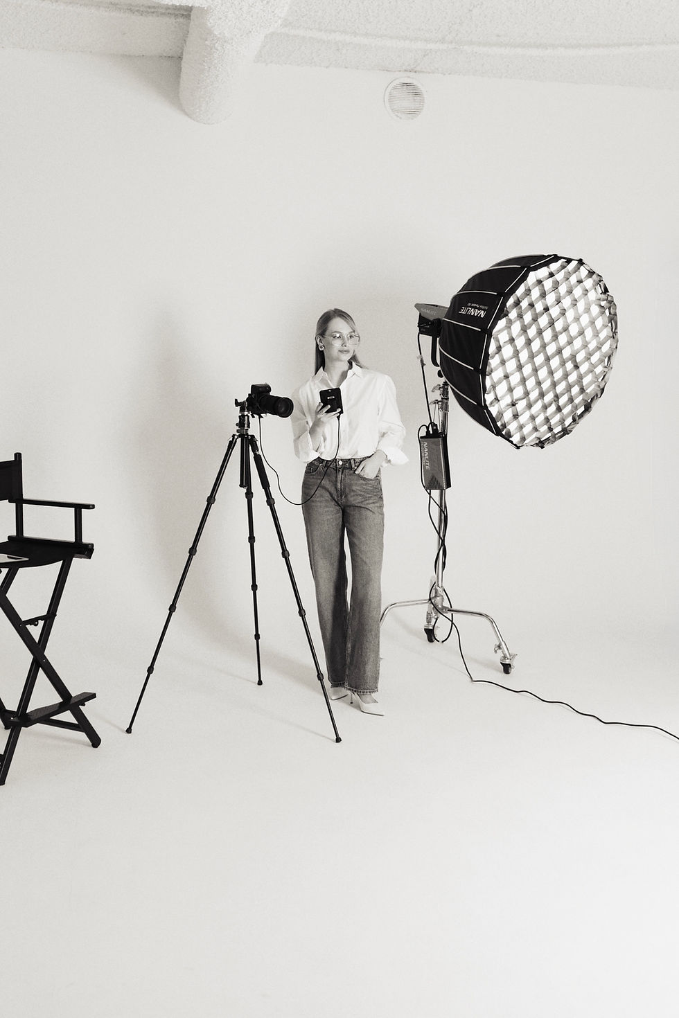 Film set with camera and studio lighting — OMRANNI video production