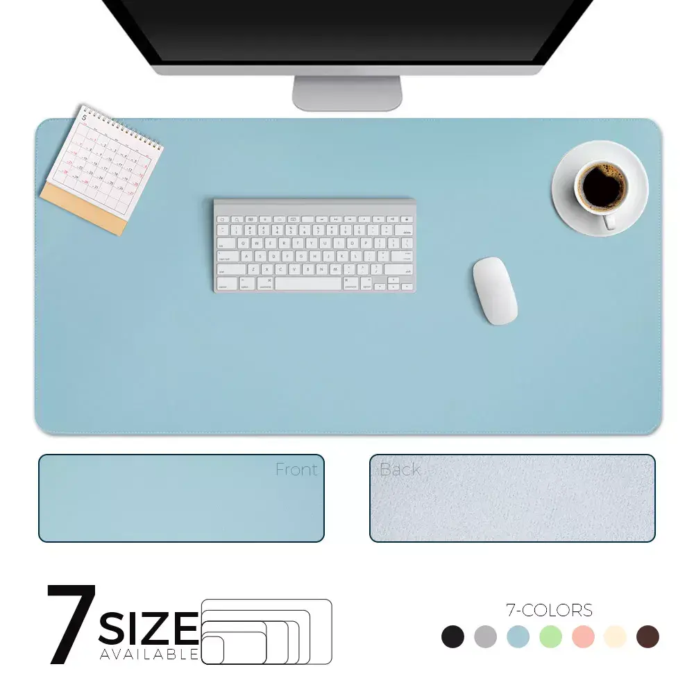 Light blue desk mat with keyboard, mouse, and monitor