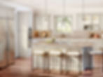 Chic kitchen with light gray cabinets, marble island, and wood floors. Sunlit window view, pendant lights, stools, and fruit bowl.