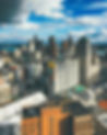 vertical-picture-of-buildings-under-a-cloudy-sky-a-2025-02-02-22-33-39-utc.jpeg